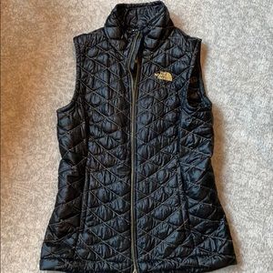 Like new black and gold vest!